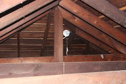 Older attics in New Orleans often have no insulation.