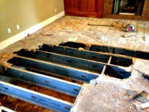 Sub-flooring that has rotted due to moisture problems.