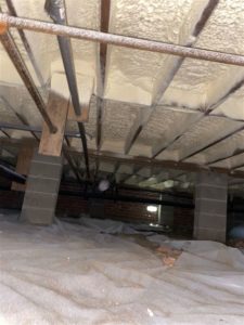 Subfloor of Building with closed cell spray foam insulation at night 12