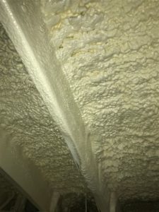 Subfloor of Building with closed cell spray foam insulation at night 29
