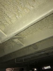 Subfloor of Building with closed cell spray foam insulation at night 33