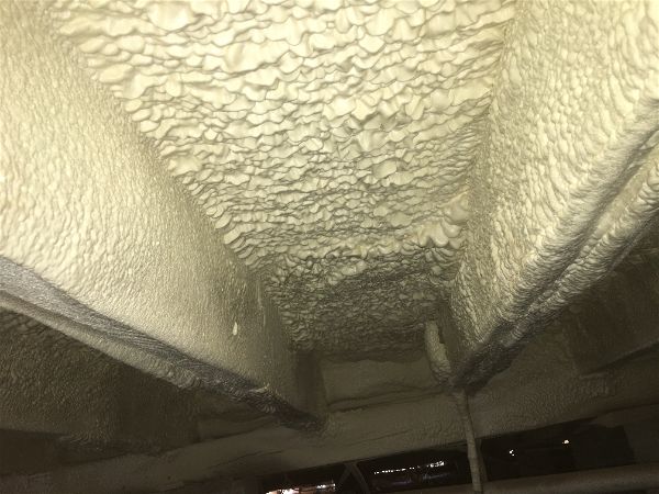 Finished crawlspace with a proper coat of closed cell spray foam insulation