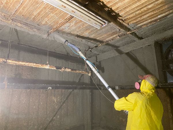 Spraying fireproofing materials on walls and ceilings