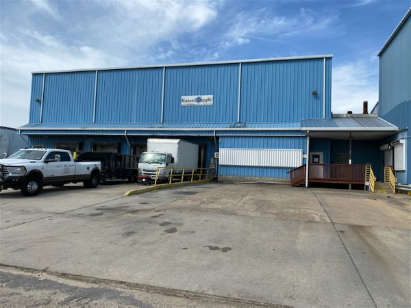 Exterior view of a commercial building being fireproofed inside