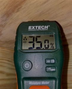 Moisture meter showing high levels of moisture contained in the clients subfloor