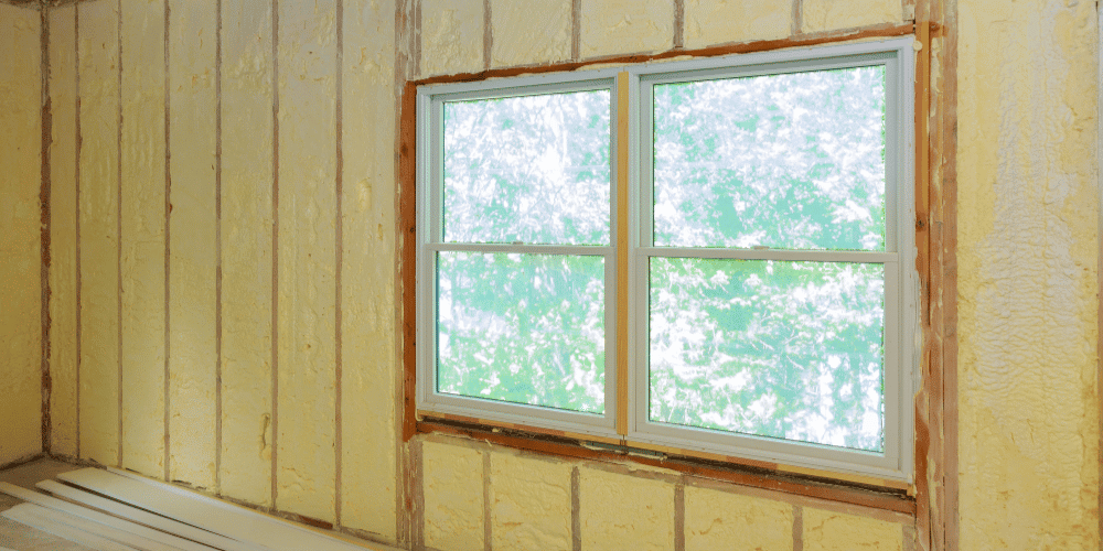 Interior walls after the application of spray foam insulation