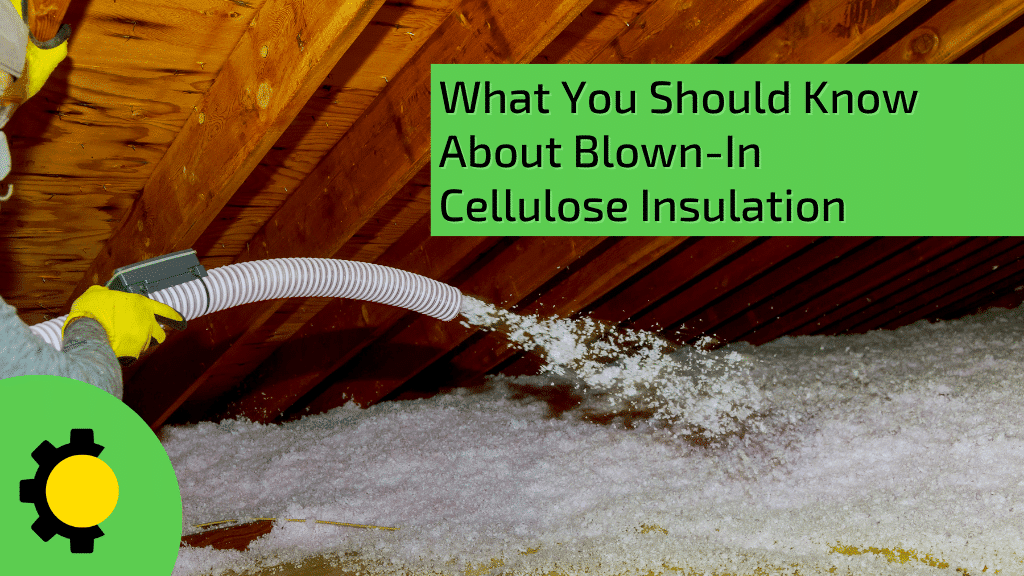 A certified contractor applying blown-in cellulose insulation to an attic