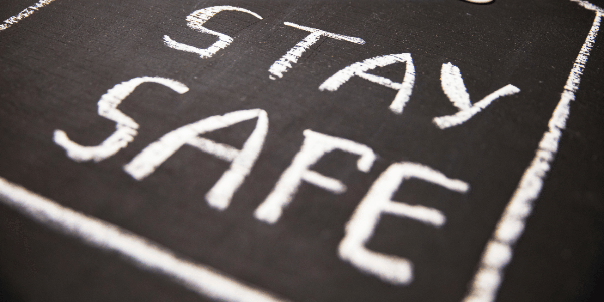 A chalkboard that says stay safe