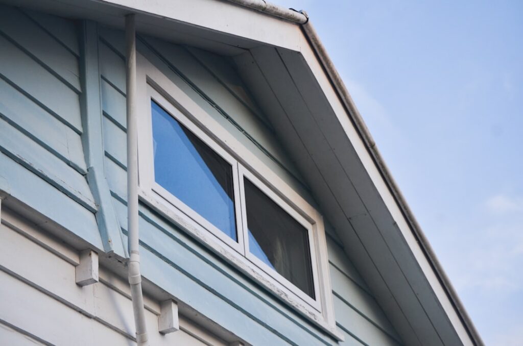 Condensation forming on the inside of a residential window, illustrating the excess humidity in a home caused by an oversi...